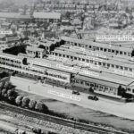 post 1934 doctored aerial view showing new tall experimental building by the railway (with old Bentalls depository erased for clarity)