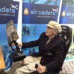 A special visitor tests the Air Training Corps flight simulator